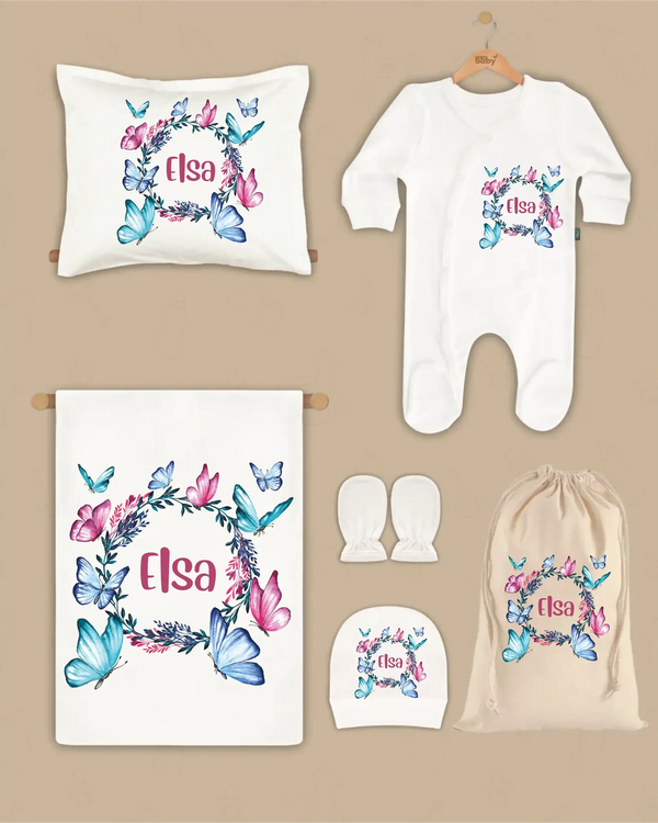 Gepersonaliseerde 6-delige newborn cadeauset met Vlinderbloemen en naam 'Elsa' voor baby's.