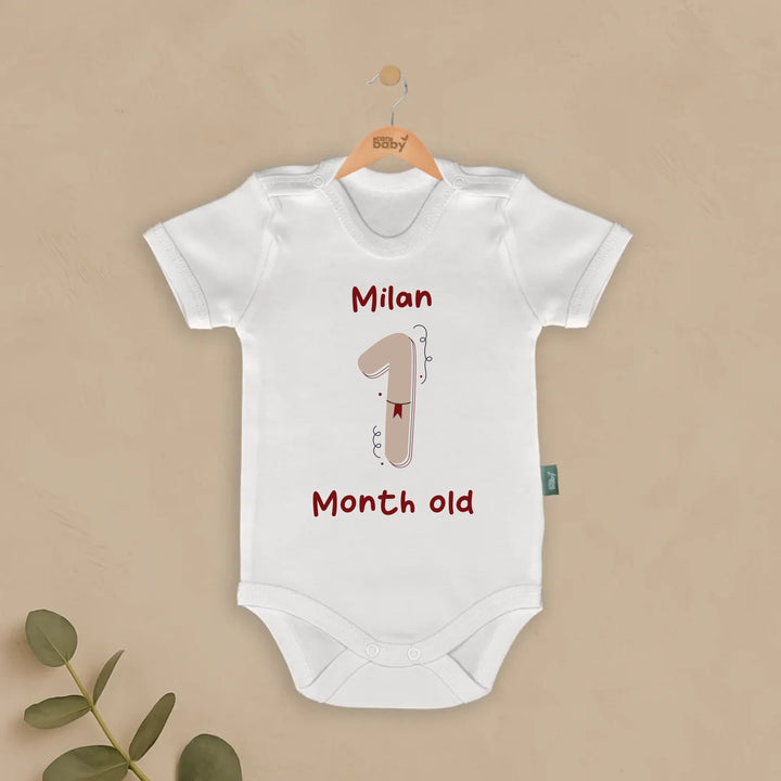 Vintage baby romper set featuring name 'Milan' with '1 Month Old' print, perfect for milestone celebrations.