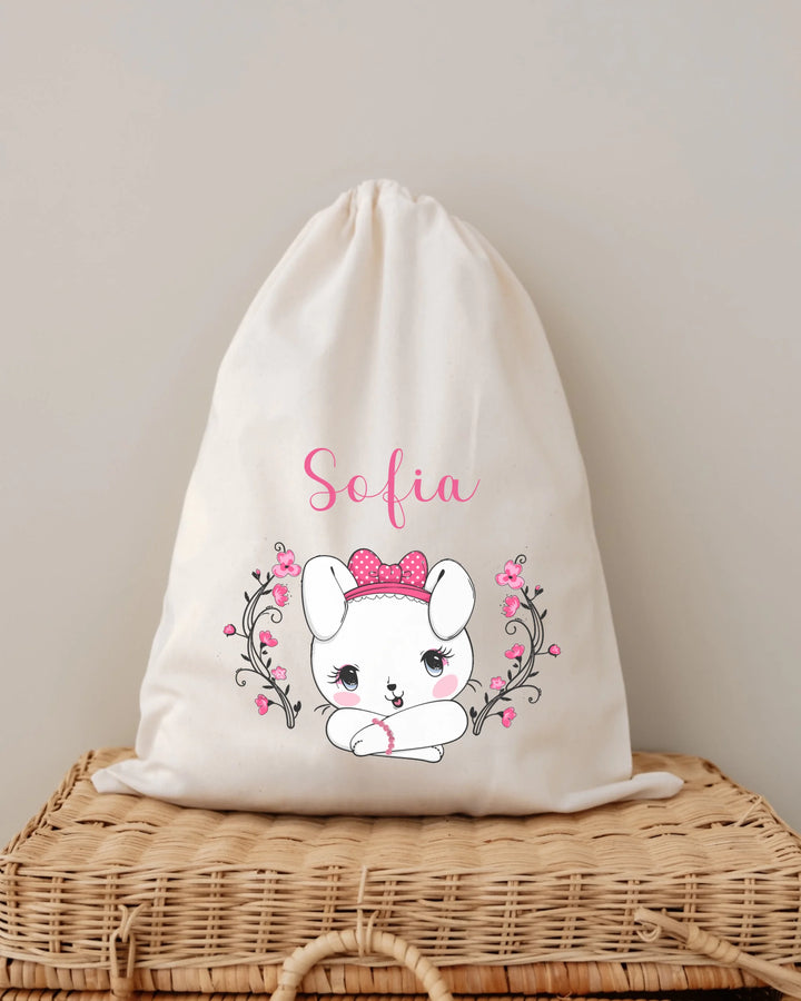 Persoonlijke babyzak met konijntje en naam Sofia, ideaal voor babykleding en cadeaus.