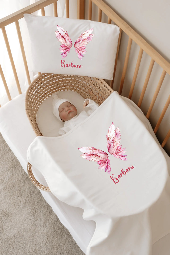 Baby in a crib with personalized bedding featuring pink butterfly design and the name 'Barbara'.