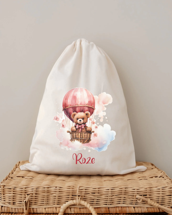 Gepersonaliseerde zak met teddybeer in luchtballon en naam Roze, ideaal voor babycadeaus.
