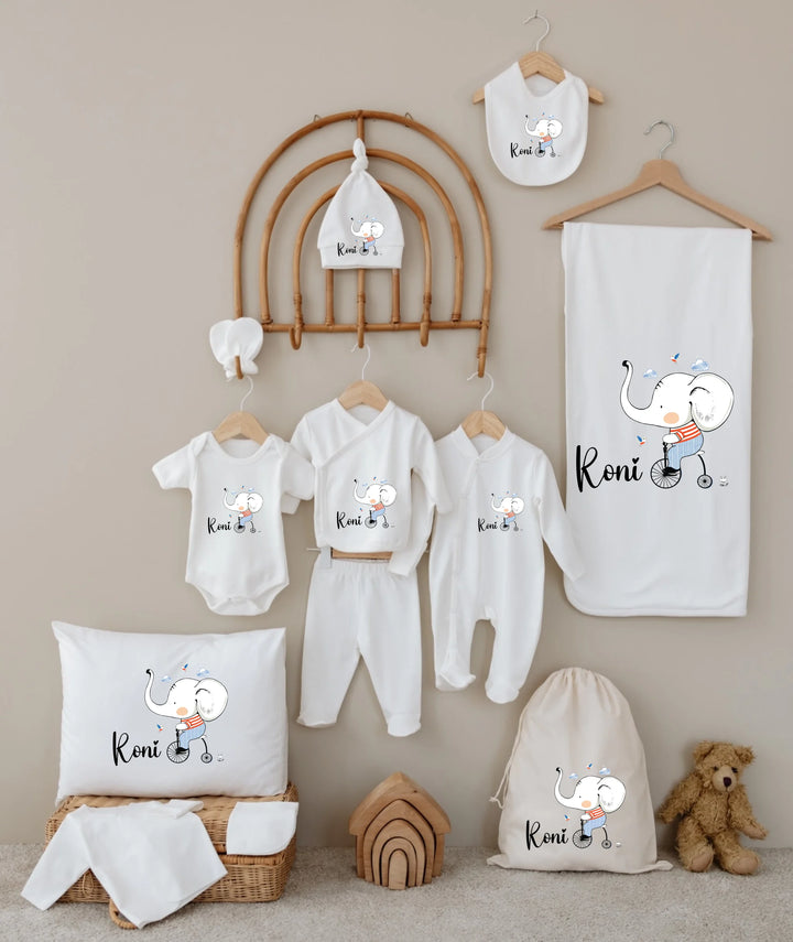 Olifant gepersonaliseerde babyset met naam, 12-delige outfit en schattige olifant illustraties, perfect voor newborns.