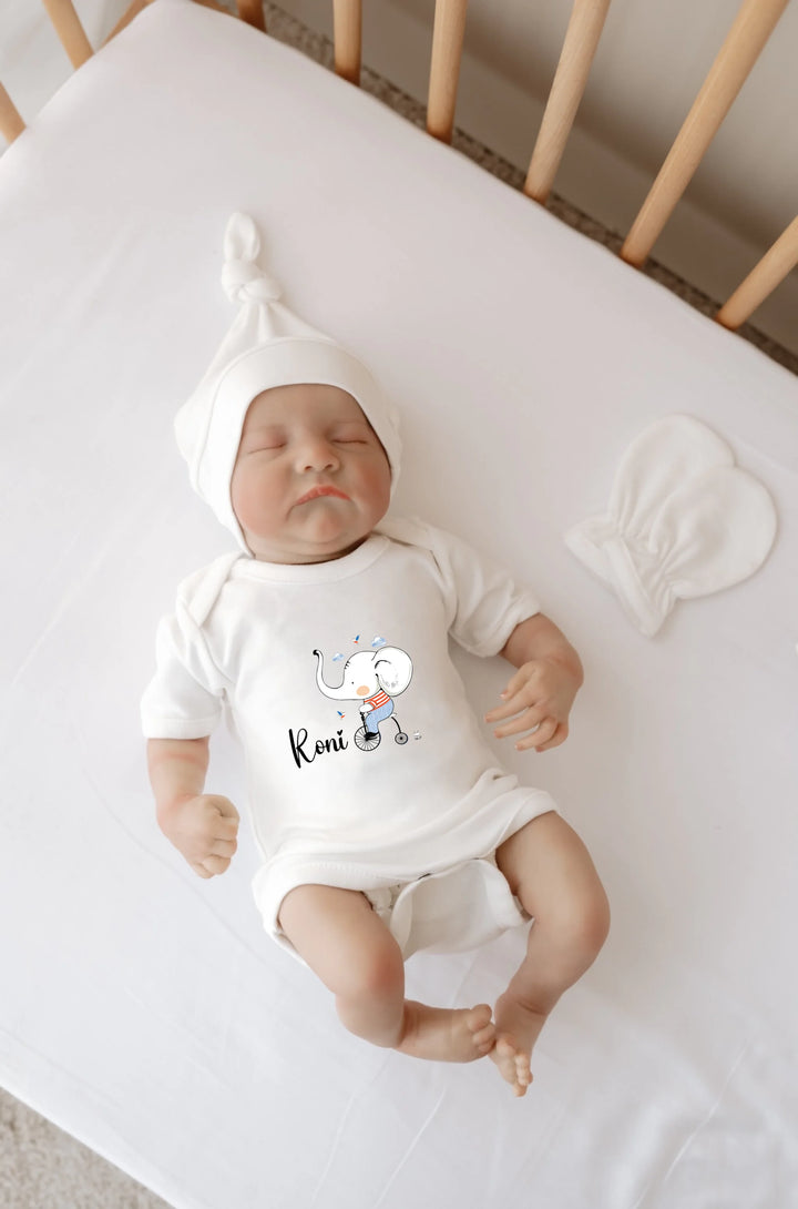 Gepersonaliseerd babyrompertje met olifant illustratie en naam Remi, perfect voor jouw pasgeboren baby.