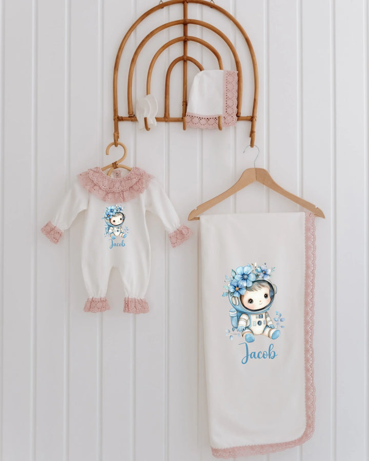 4-piece newborn astronaut set with lace details, including onesie, blanket, and hat personalized for Jacob.