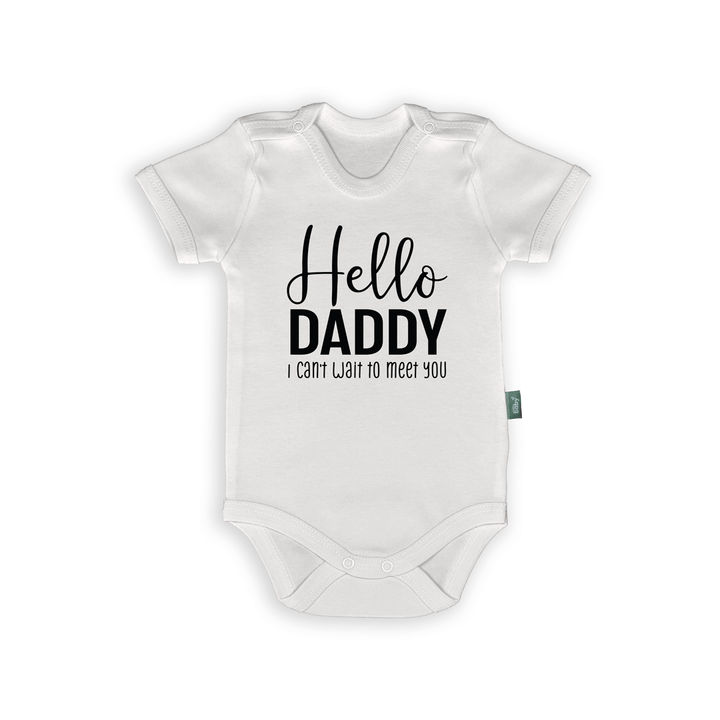 White baby romper with text "Hello Daddy, I can't wait to meet you" for pregnancy announcement.