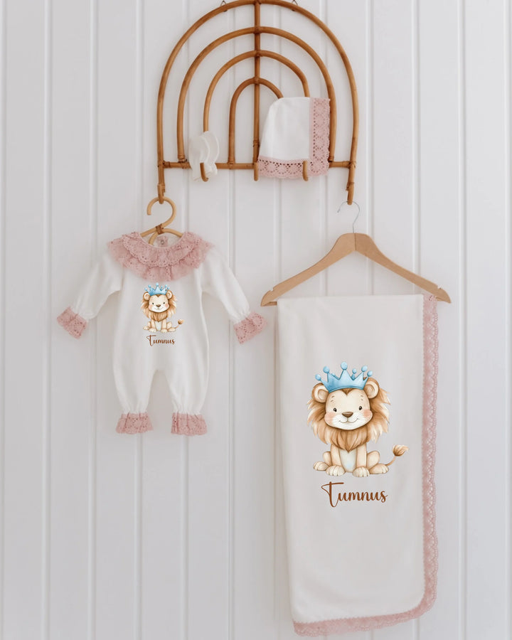 4-piece newborn girl set with lion print romper, lace cap, and blanket, personalized for baby Tummus.
