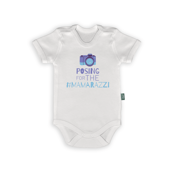 White baby romper with the text 'Posing for the #Mamarazzi' and a camera graphic, perfect for trendy infants.
