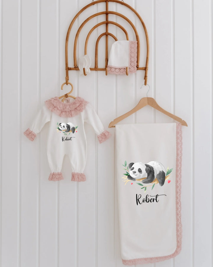 Panda newborn outfit set for girls with personalized name, featuring panda illustration and soft blanket.