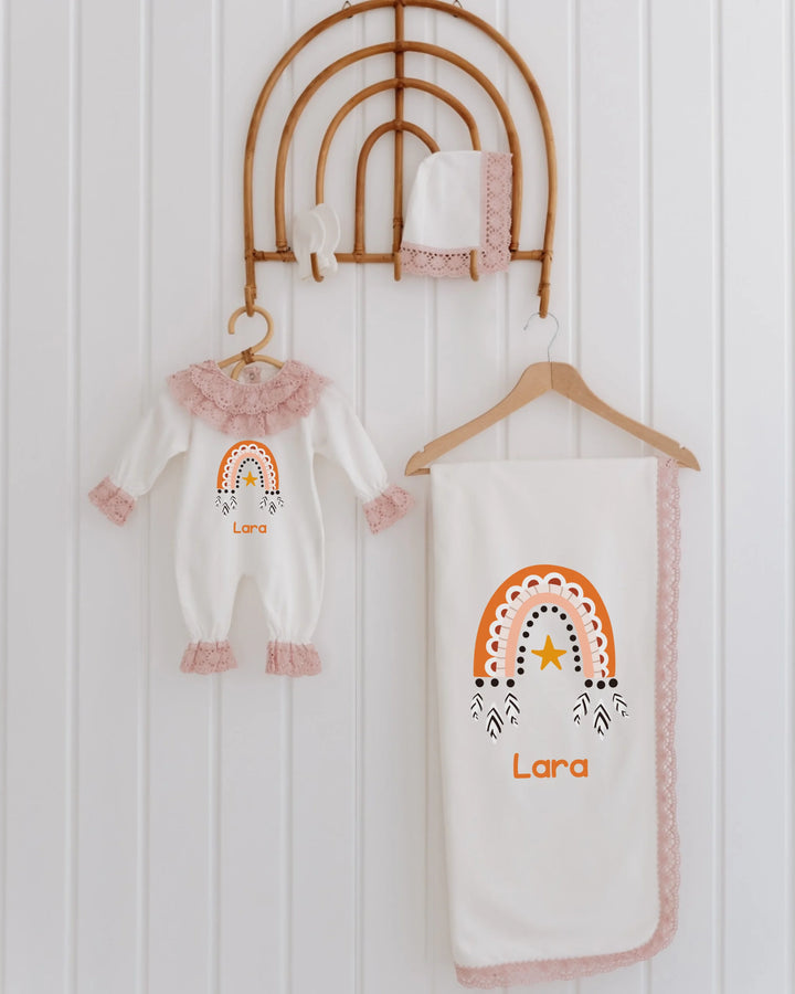 Boho newborn clothing set for girls featuring rainbow design, personalized with name Lara and lace details.