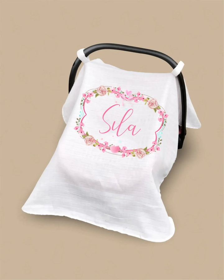 Personalized floral baby sunshade for car seat with the name 'Sila' printed on it.