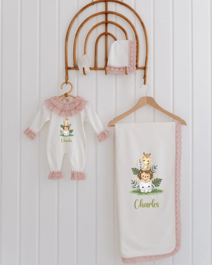 4-piece newborn girl outfit with safari animal print and lace details, personalized with the name Charles.